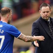 Rangers manager Michael Beale, right, shakes the hand of Scott Arfield at Hampden today