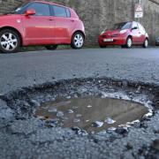 THE number of potholes on Scotland's roads is estimated to have soared by nearly 50% in just a year