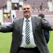 Celtic manager Ange Postecoglou hails the Parkhead club's fans at Tynecastle today