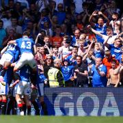 Rangers players celebrate John Souttar's goal against Celtic at Ibrox today with their fans
