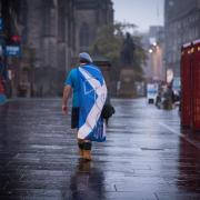 A dejected Yes supporter makes his way home after the 2014 referendum result