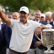 Brooks Koepka celebrates with the Wanamaker trophy after winning the PGA Championship golf tournament at Oak Hill Country Club on Sunday, May 21, 2023, in Pittsford, N.Y.(AP Photo/Eric Gay).