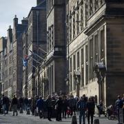 Tourists throng Edinburgh's Royal Mile