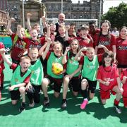 Steve Clarke joins children at a McDonald’s Fun Football session in Glasgow's George Square.