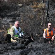 Wildfire L-R Jamie Thrower incident commander with SFRS and Simon McLaughlin from the RSPB at the scene of wildfire near Cannich in the Scottish Highlands...