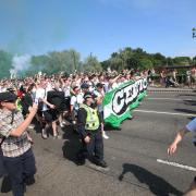 Celtic fans march through city
