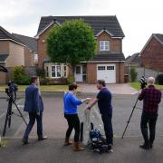 Members of the news media outside Nicola Sturgeon's home on Sunday