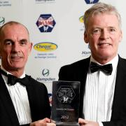 Joe Jordan presents best friend Gordon McQueen with his award as he was inducted into the Scottish Football Hall of Fame in 2012.