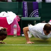 Jamie Murray (right) and Taylor Townsend celebrate with press-ups (Victoria Jones/PA)