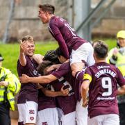 Hearts players celebrate Yutaro Oda's goal against St Johnstone at McDiarmid Park today