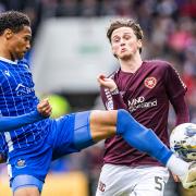 Rangers loanee Alex Lowry, right, in action for Hearts against St Johnstone at McDiarmid Park this afternoon
