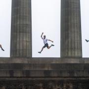 Performers (left to right) Lisa Whitmore, Toffy Paulweber and Jared Shanks from circus company Brainfools during a photocall on Calton Hill in Edinburgh