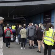 Queues spilled out of Edinburgh Airport's terminal.