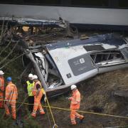 The scene of a rail crash near Stonehaven which killed three people