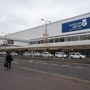 Disruption reported at Glasgow Airport following taxi fire in car park