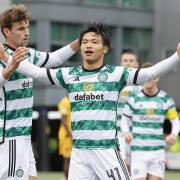 Reo Hatate celebrates after putting Celtic ahead at Livingston.