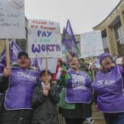 Striking Unison school workers at a rally in Buchanan Steps in Glasgow tuesday on the first of