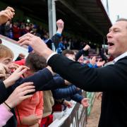 Duncan Ferguson celebrates with Inverness Caledonian Thistle fans after their 3-2 win over Arbroath at Gayfield yesterday
