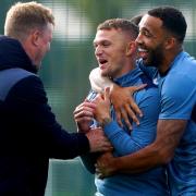 Newcastle’s Kieran Trippier and Callum Wilson speak to manager Eddie Howe during a training session at the Newcastle United Training Centre, Darsley Park, Benton. Picture date: Tuesday October 3, 2023.