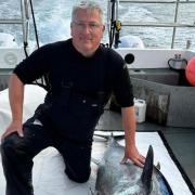 Crewman Kenny Maclean with a bluefin tuna