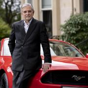 Brian Gilda is developing expansion plans for the Peoples car sales business he founded in 1983