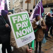 Workers taking part in a recent Unison strike