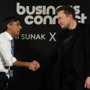 Rishi Sunak shakes hands with Elon Musk