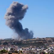 An Israeli air strike on the outskirts of Aita al-Shaab, a Lebanese border village (Hussein Malla/AP)