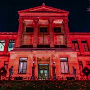 Kelvinside Academy in Glasgow has lit up red for Remembrance Day