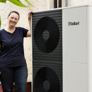 Claire Miller with a heat pump
