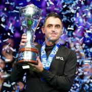 Ronnie O’Sullivan celebrates with the trophy (Mike Egerton/PA)