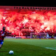 Rangers fans stage a coordinated flare display at Dens Park last month