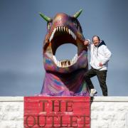 John Webb with the Dinosaur sculpture