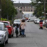 Pavement parking makes moving around tough for people in wheelchairs or with buggies