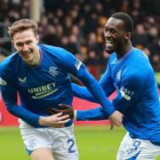 Kieran Dowell, left, celebrates his goal against Motherwell with Abdallah Sima at Fir Park today