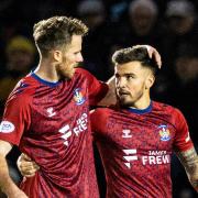 Marley Watkins is congratulated by teammate Danny Armstrong after firing Kilmarnock ahead at St Mirren.