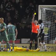 St Mirren's Olutoysi Olusanya was originally shown a yellow card for a challenge on Celtic keeper Joe Hart, but it was upgraded to a red after a VAR review.