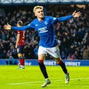 Ross McCausland celebrates scoring a goal for Rangers at Ibrox last year
