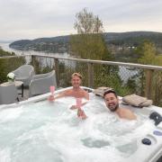 Phil MacHugh and Martin Compston try out the facilities in their simple Norwegian 