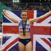 Laura Muir celebrates with her medal after winning the 3000m. (Martin Rickett/PA)