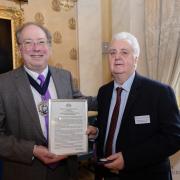 Ian Angus Mackenzie (right) winning the prestigious Silver Medal from the Worshipful Company of Weavers