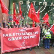 SQA staff and Unite members outside the Glasgow office with STUC general secretary Roz Foyer in attendance