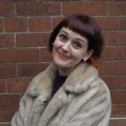 Glasgow comedian Zara Gladman has spoken out against cuts to a mentoring scheme for disadvantaged children