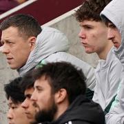 Celtic captain Callum McGregor watches the Scottish champions lose 2-0 to Hearts at Tynecastle today