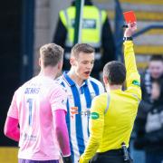 Lewis Mayo is shown a red card