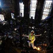 Forensic archaeologists sifting through the remains of the Mackintosh Library after a fire devastated the building in 2014