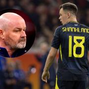 Lawrence Shankland in action for Scotland against the Netherlands in Amsterdam on Friday night, main picture, and national team manager Steve Clarke, inset