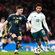Scotland's Billy Gilmour (left) and Northern Ireland's Jamie Reid battle for the bal