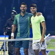 Novak Djokovic (L) and Carlos Alcaraz pose for a picture ahead of their Riyadh Season Tennis Cup exhibition tournament match in the Saudi capital last December