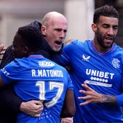 Rangers manager Philippe Clement congratulates Rabbi Matondo on his injury-time equaliser against Celtic at Ibrox today with Connor Goldson